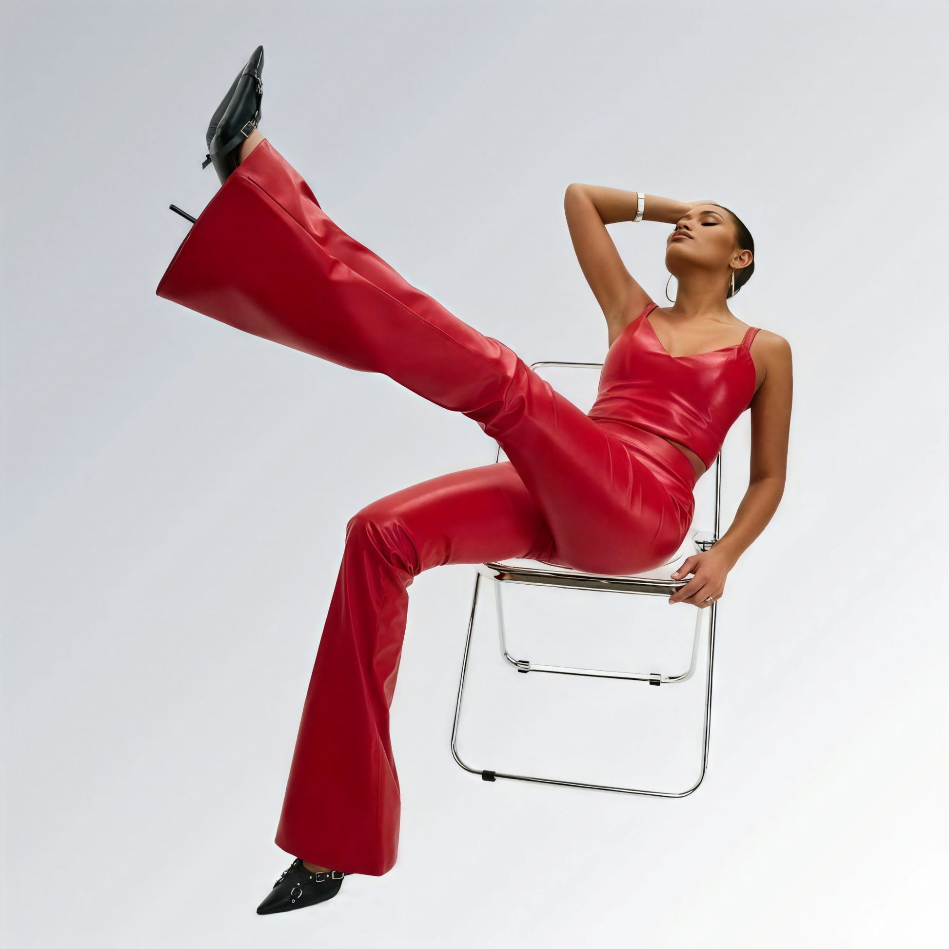 Calça Couro Sintético Boca de Sino de Cintura Alta Feminina Jz new moda