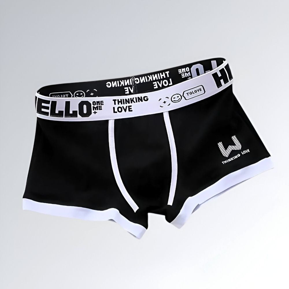 Cueca feminina boxer de algodão preta com estampa Hello, cintura elástica personalizada e acabamento confortável.