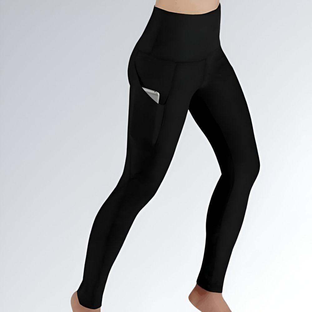 Calça legging feminina preta com cintura alta, tecido elástico e bolso lateral funcional para celular.