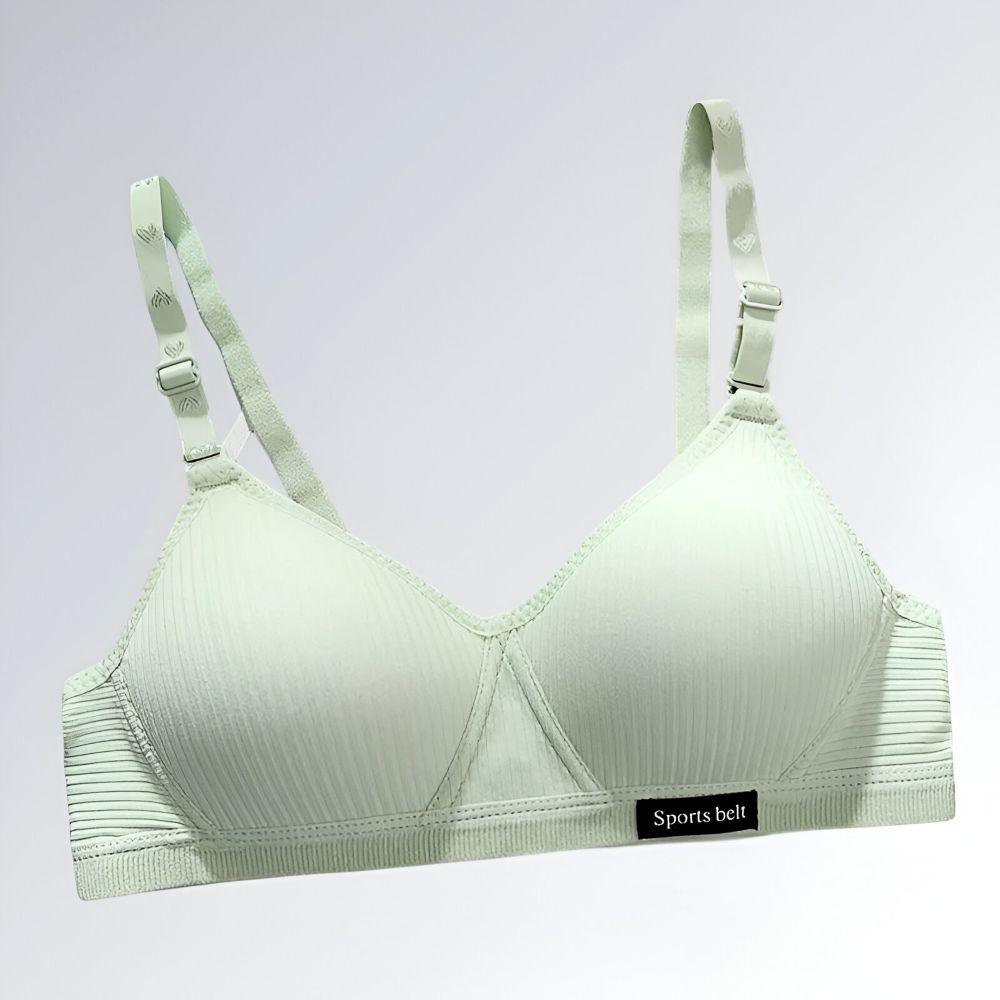 Sutiã esportivo feminino verde com bojo sem costura, alças ajustáveis e tecido respirável com textura canelada.