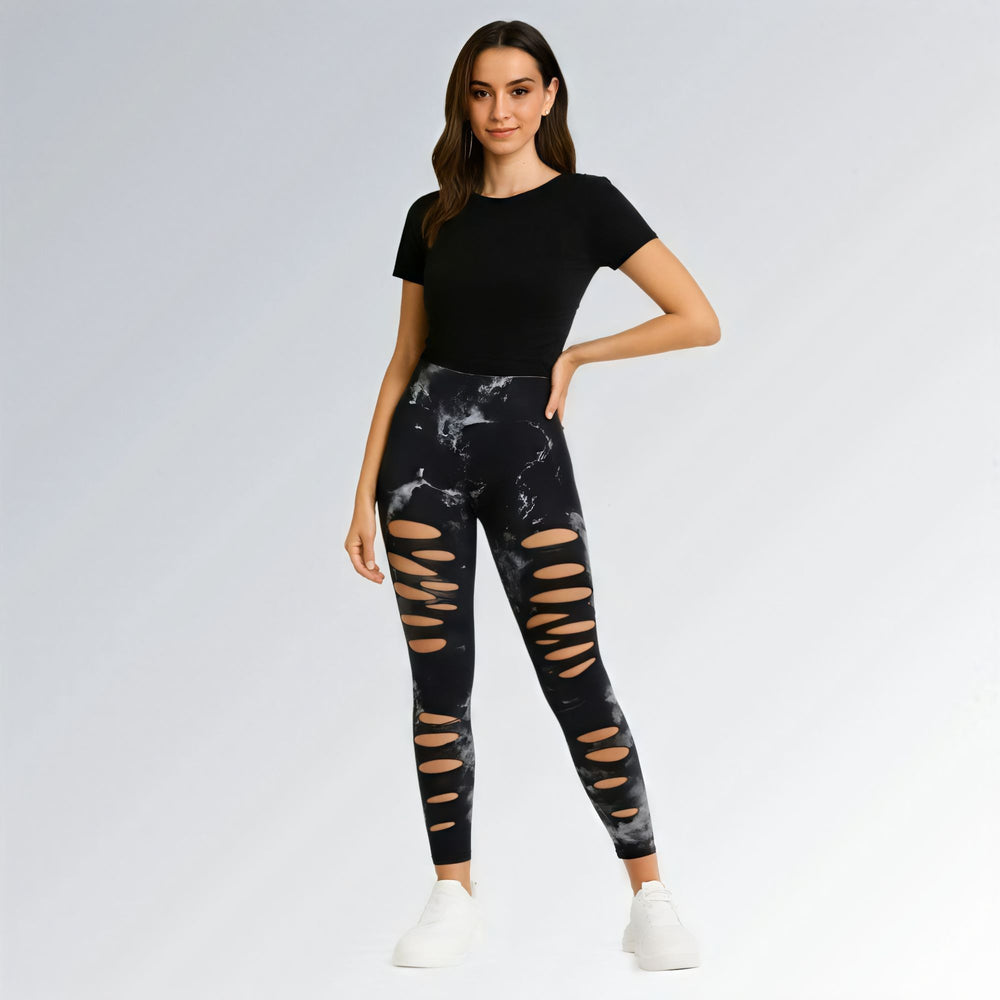 Calça legging feminina preta estilo tie-dye com cintura alta, recortes frontais e design sem costura para looks urbanos e esportivos.
