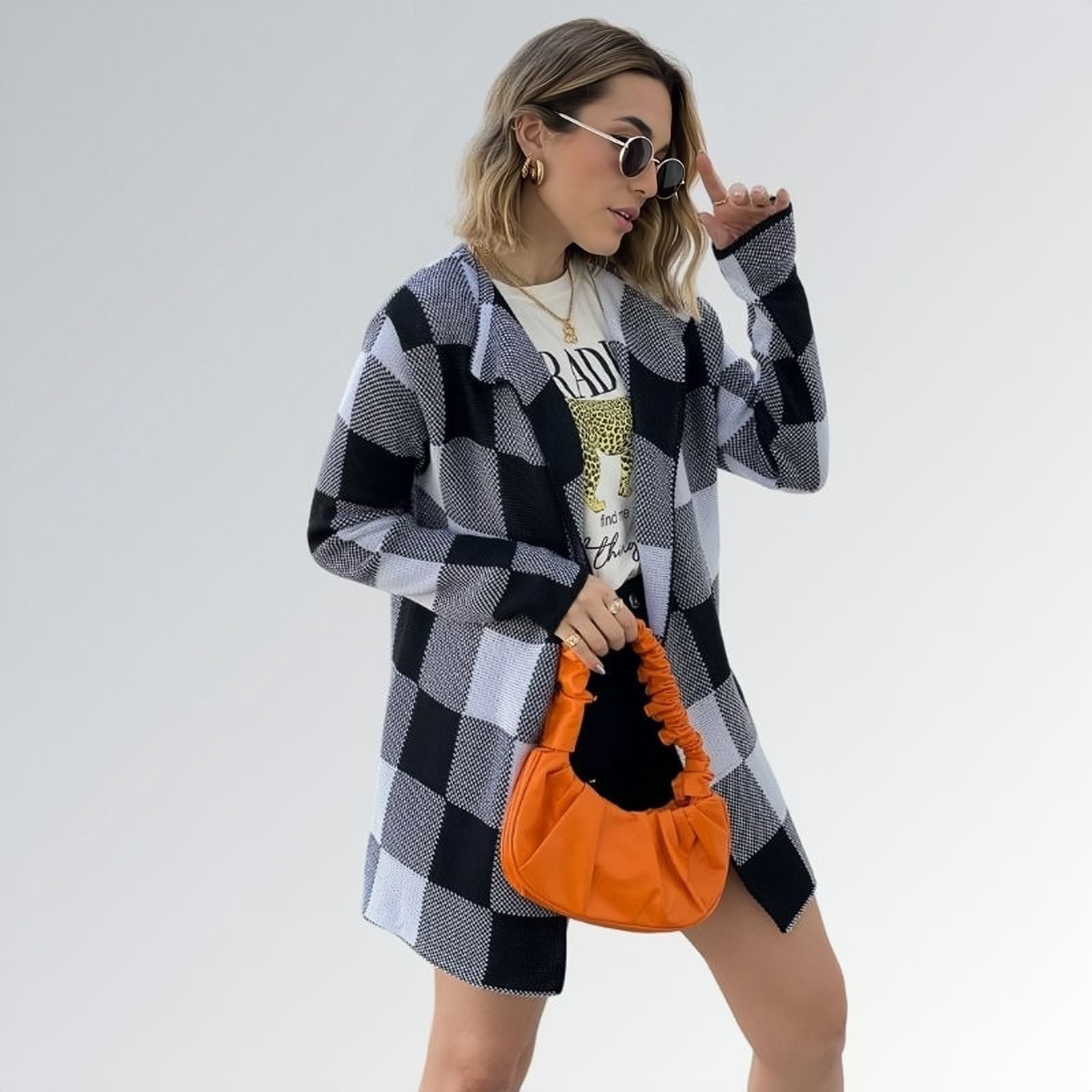 Blazer Cardigã kimono feminino preto e cinza longo  — peça versátil disponível para venda online de moda feminina elegante.