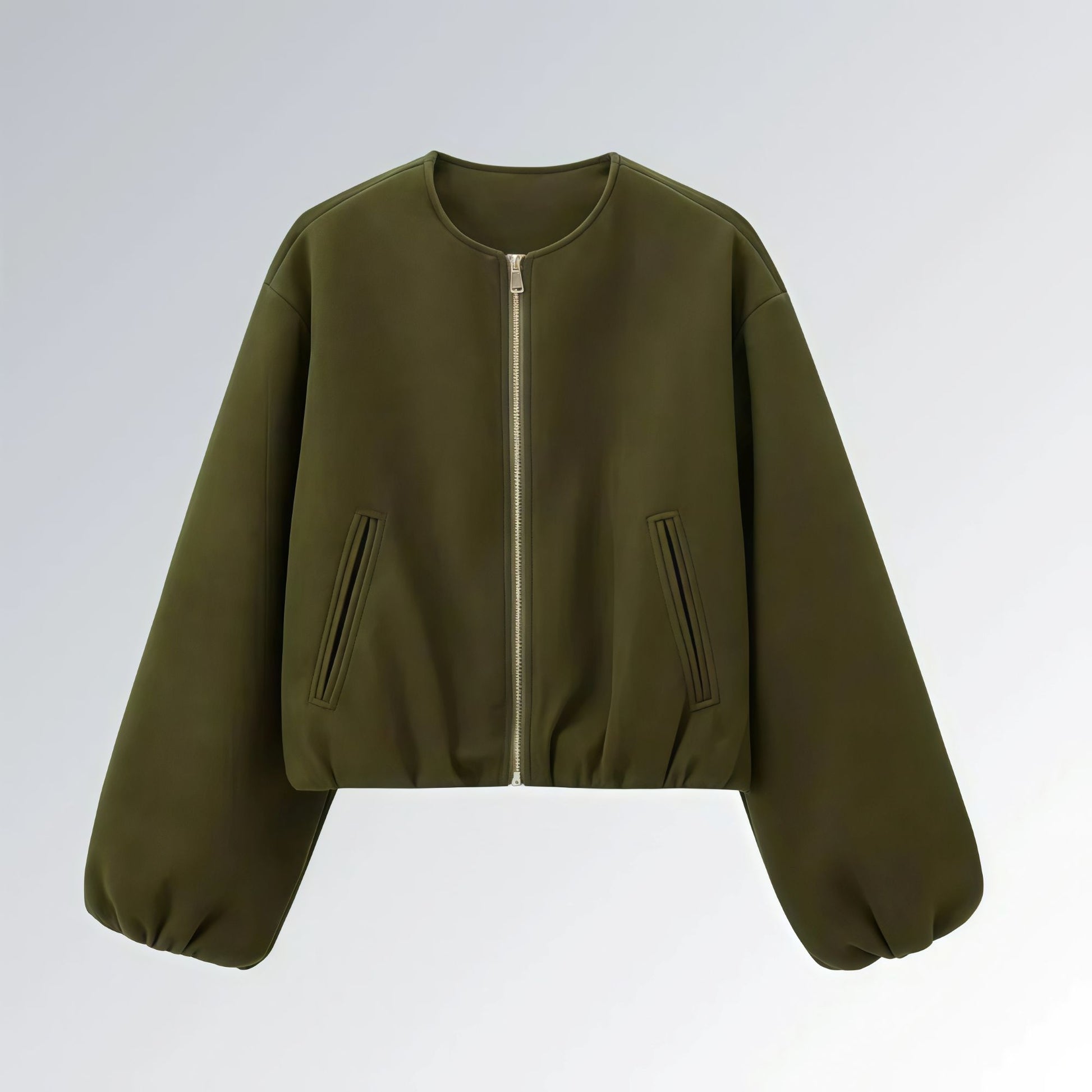 Jaqueta feminina verde militar com zíper metálico, mangas bufantes e bolsos frontais, estilo casual streetwear para o outono.